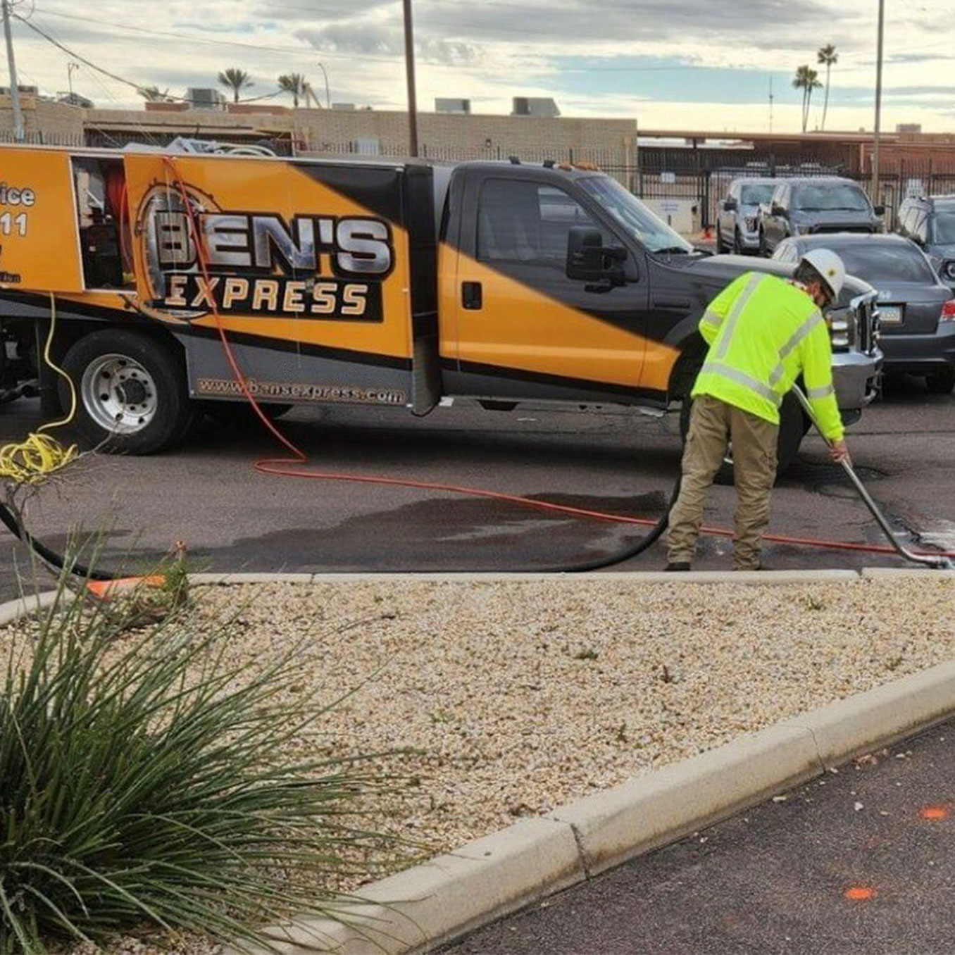 Ben's Express and team working on job in parking lot