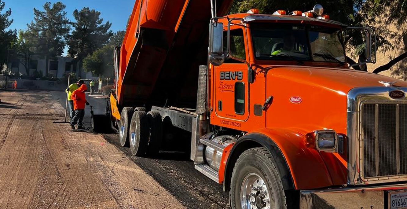 close-up of ben's express dump truck on job site